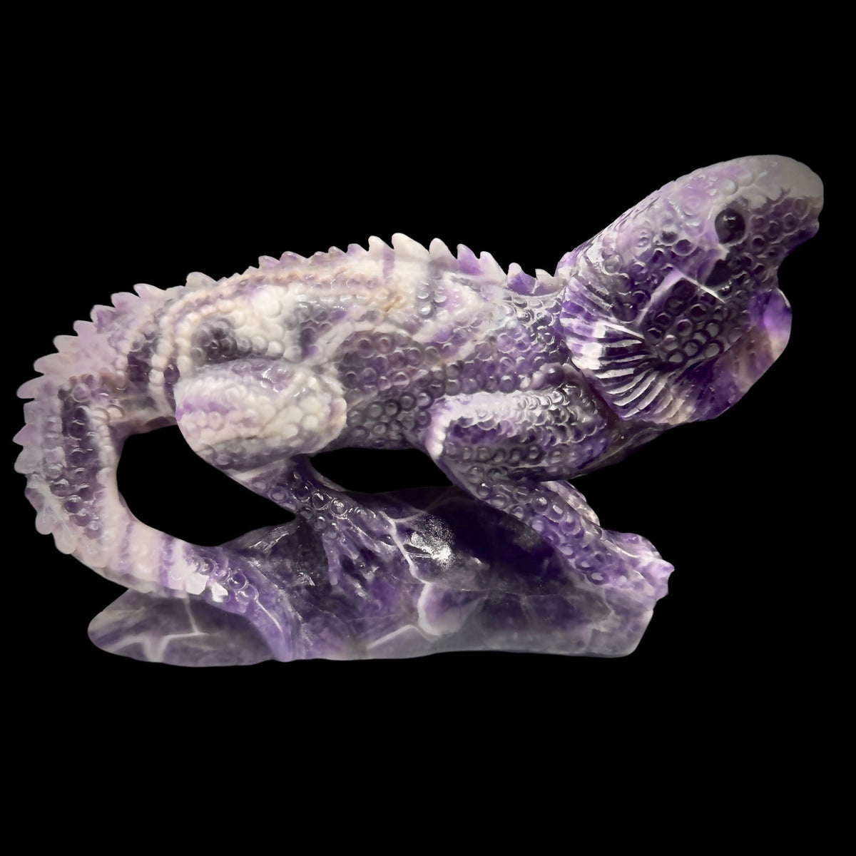	Side angle showcasing the detailed carving of the purple crystal lizard.