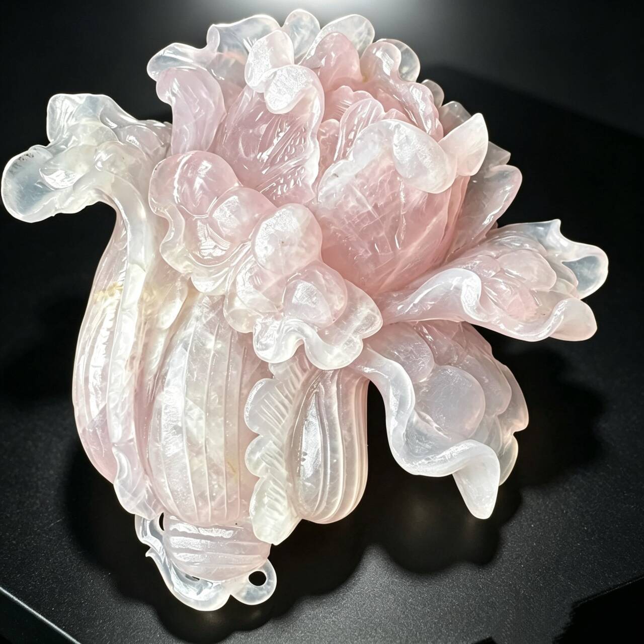 Large natural rose quartz Chinese cabbage sculpture three quarter view with curled leaf details