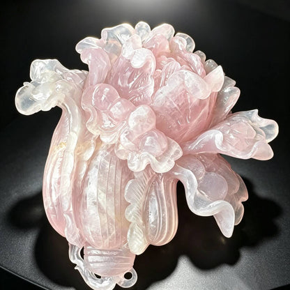 Natural rose quartz hand carved Chinese cabbage sculpture with layered translucent pink leaves front view