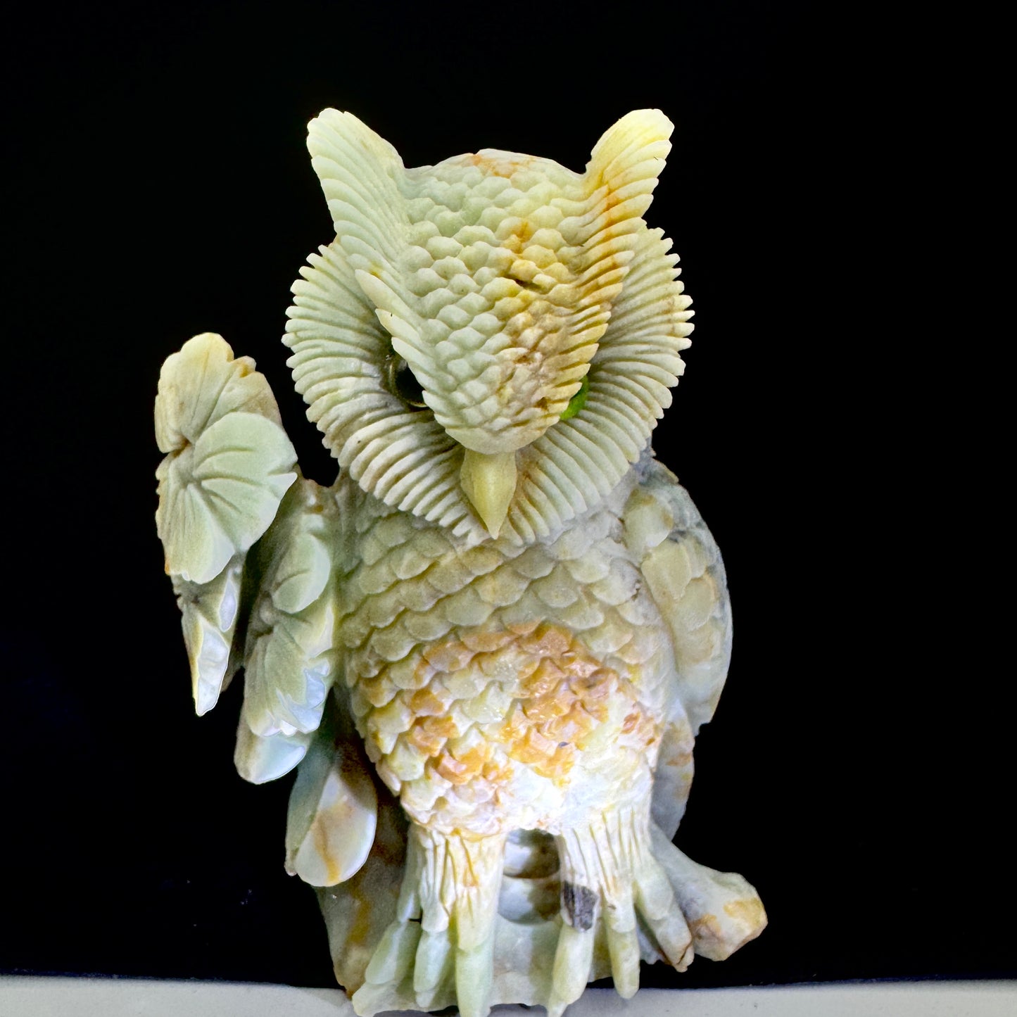 Hand-carved blue-green Amazonite owl statue showing detailed feather patterns, ideal for spiritual decor.