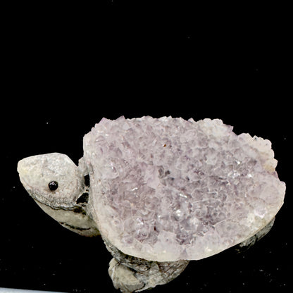 The sculpture placed on a meditation altar to aid in grounding during spiritual practice.