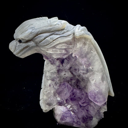 A shot emphasizing the skilled hand-carving that brings the dragon to life from the raw stone.