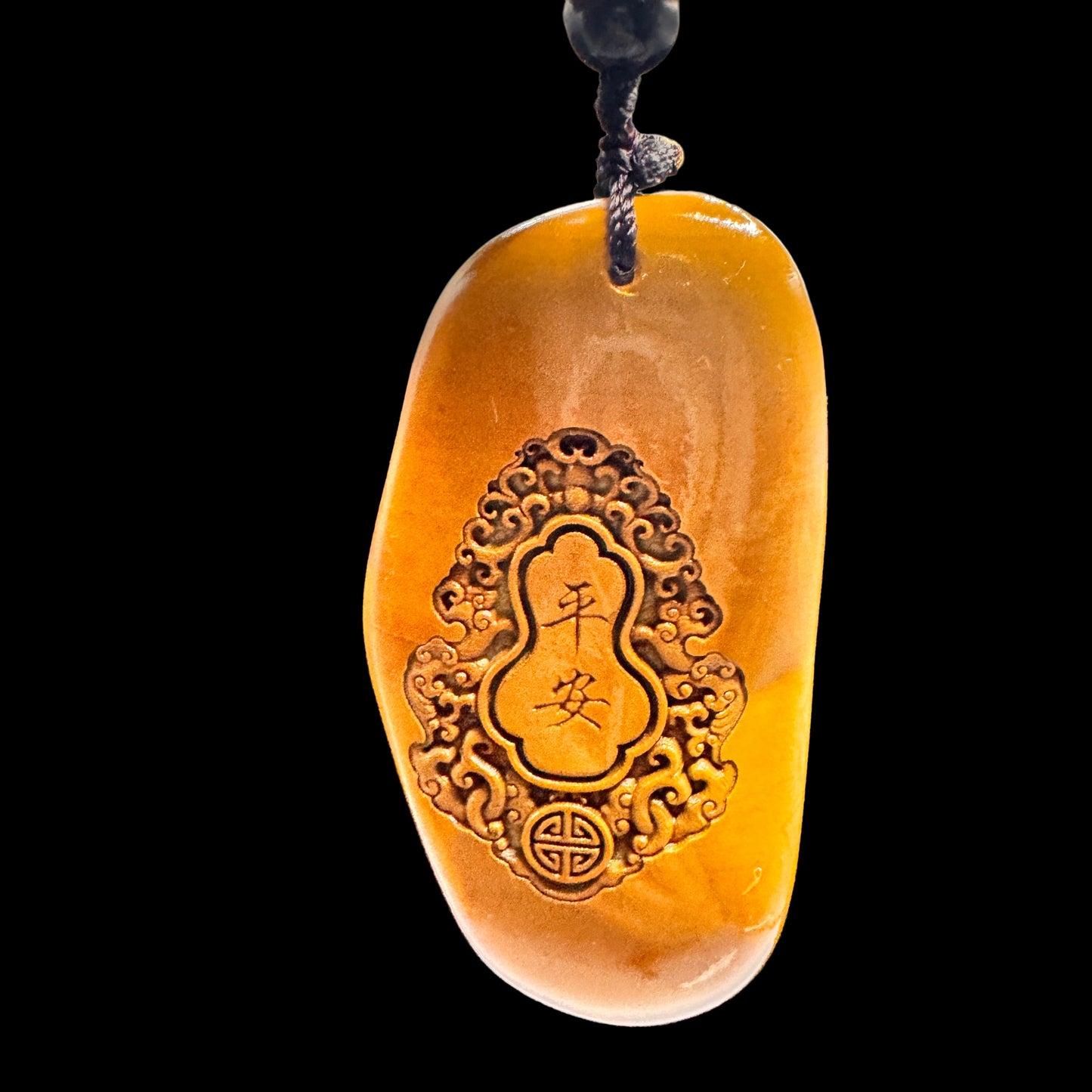  The green stone bamboo pendant worn near the chest to support heart chakra balance and emotional wellbeing.