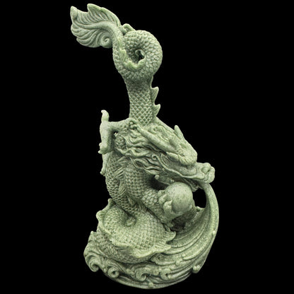 The dragon statue wrapped as a gift for a spiritual seeker or entrepreneur.
