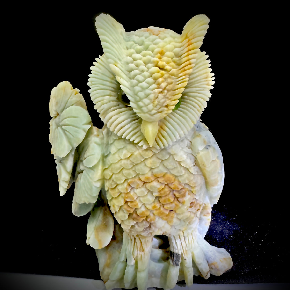 Macro shot of Amazonite crystal veins in the owl figurine, emphasizing its natural healing energy.