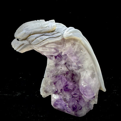 The dragon depicted as a bridge between earth (agate) and spirit (amethyst).