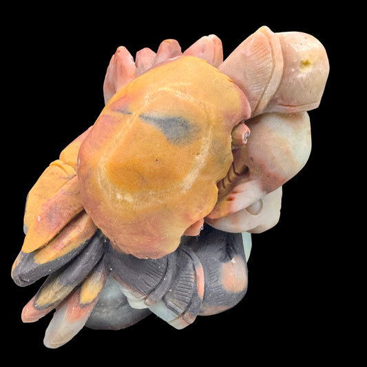 Front view of the handmade crab carving on a natural Amazonite crystal cluster.