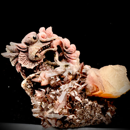 Close-up detail of the artisan's handiwork in carving the dragon onto the natural crystal.