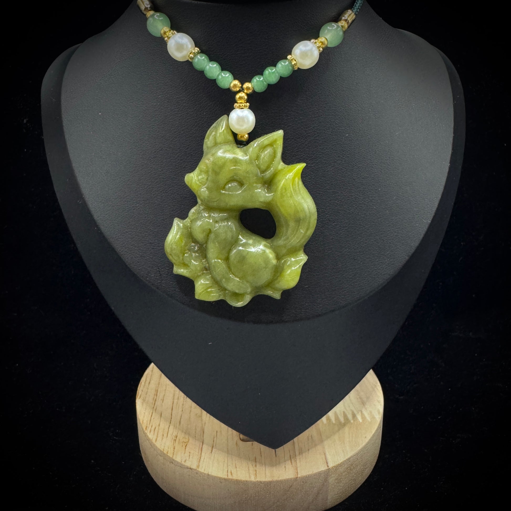 Handcrafted fox necklace featuring genuine Xiuyan jade

