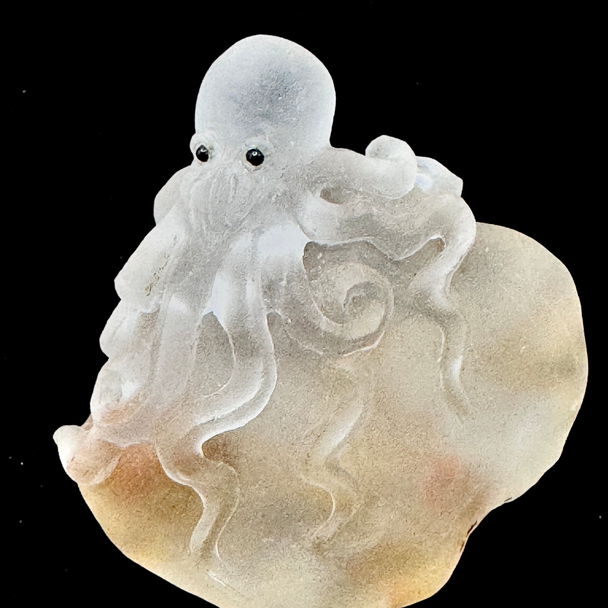  This art piece helps in aura cleansing through its crystal material and symbolic design.

