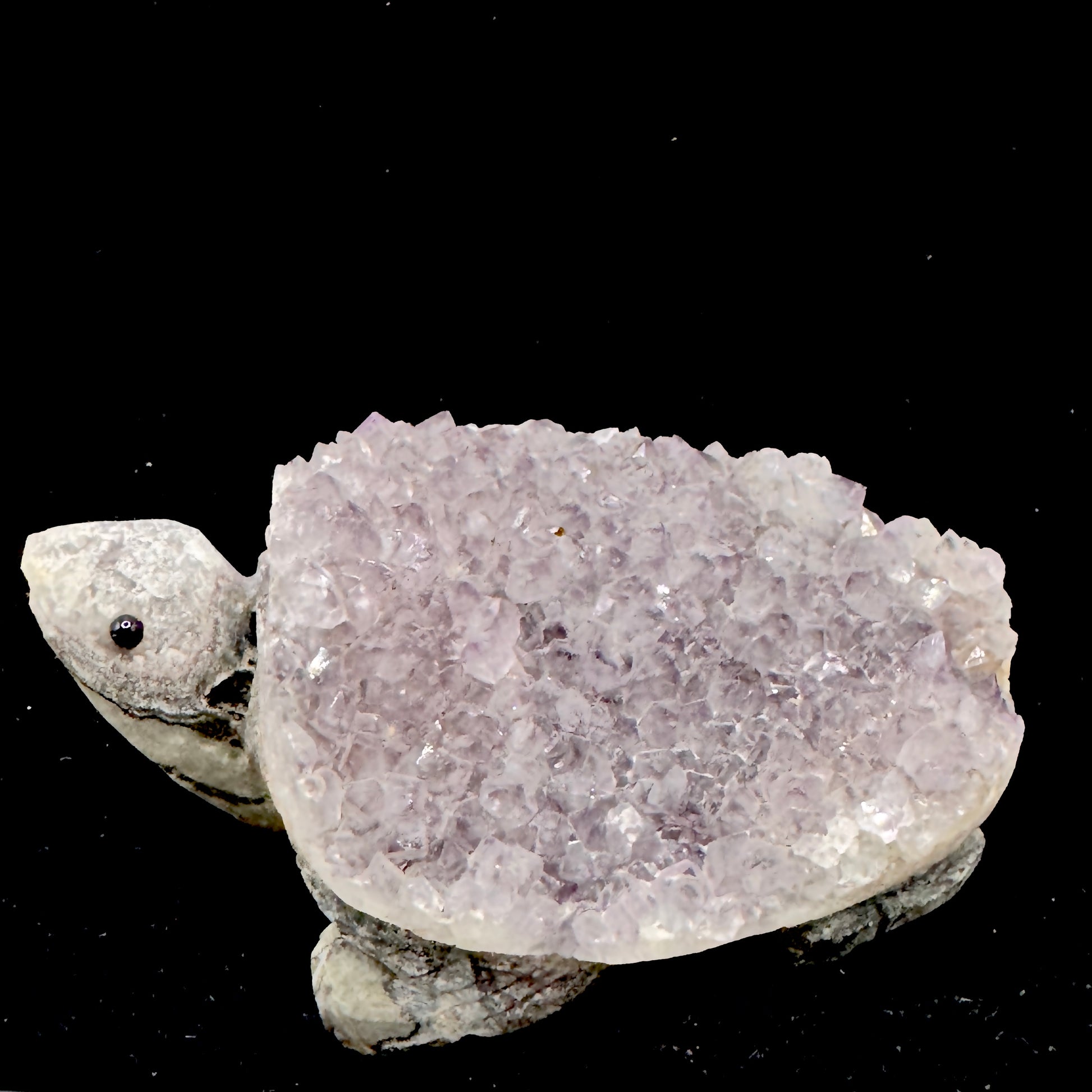 Emphasizing the artisan skill required to carve the tortoise from the hard crystal material.