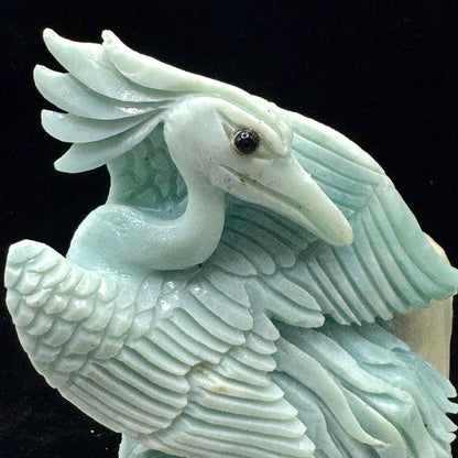 The bird in a quiet meditation corner, serving as a focal point for tranquility.