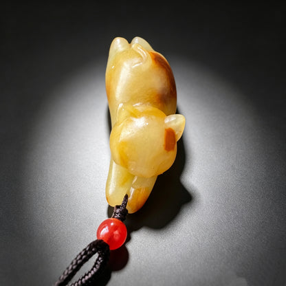 Natural jade carved resting cat pendant front detail