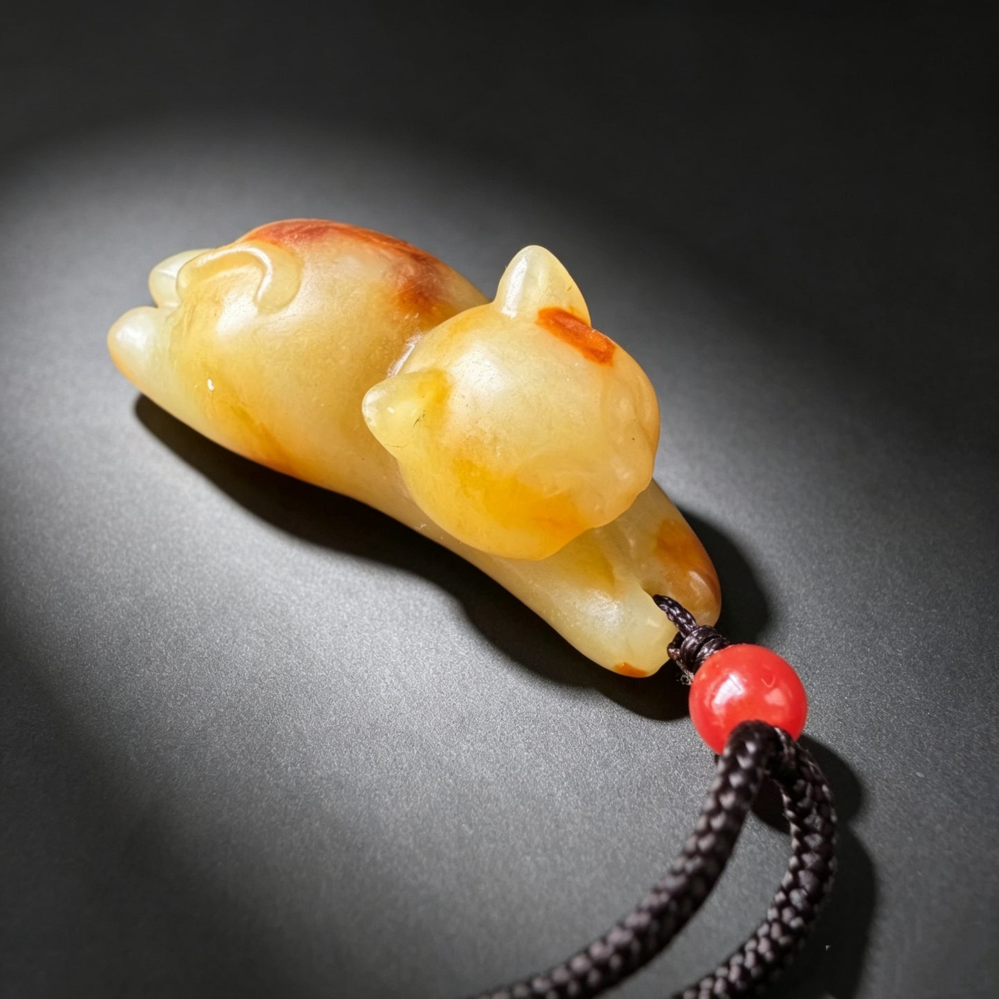 Natural jade cat pendant back and underside view