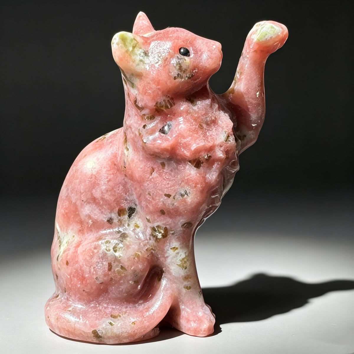 Natural stone carved cat sculpture back view showing pink stone patterns

⑩ 图片文件名