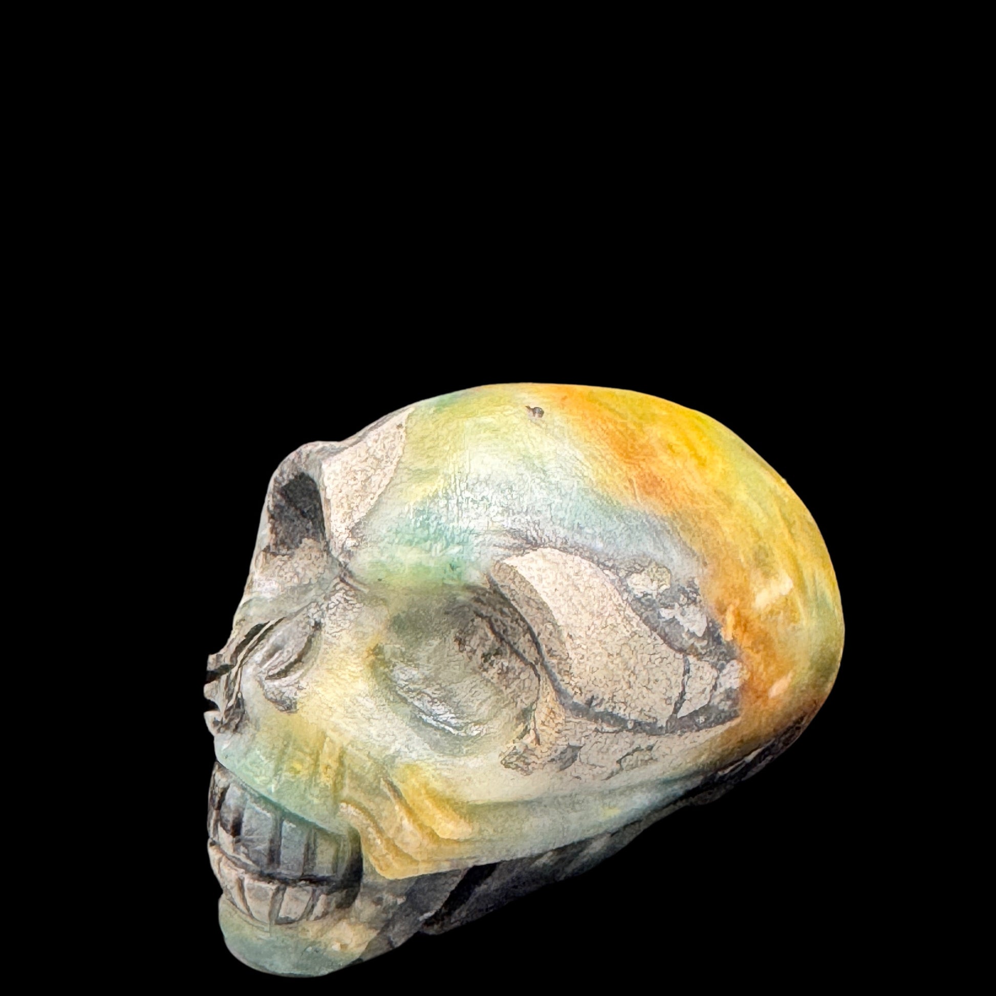 Amazonite skull held in hands during meditation.