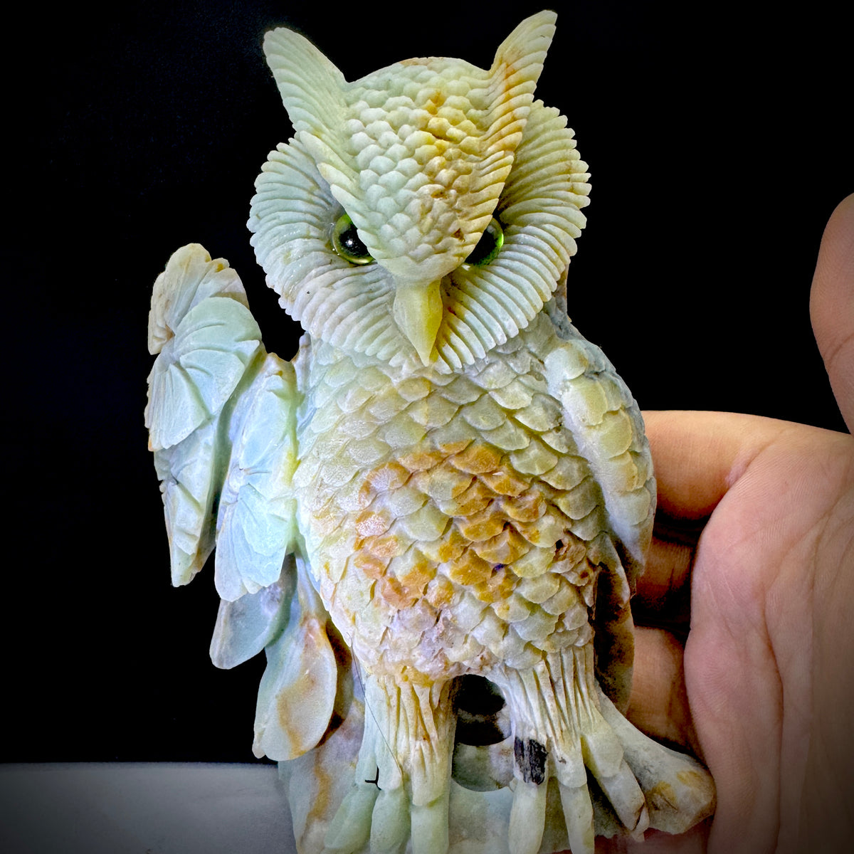 Amazonite owl as a desk accessory, promoting focus and stress relief during work.