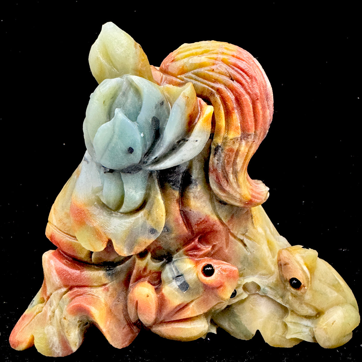 The calming presence of the green Amazonite frog, promoting hopeful and peaceful vibes.