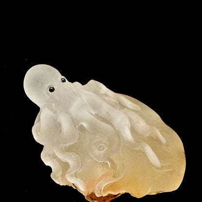 The octopus sculpture glows in sunlight, enhancing its metaphysical properties for energy work.