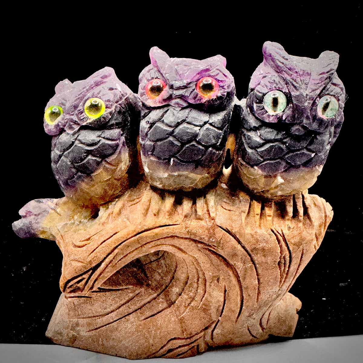 Close up of fluorite owl eyes showing natural crystal inclusions for protection

