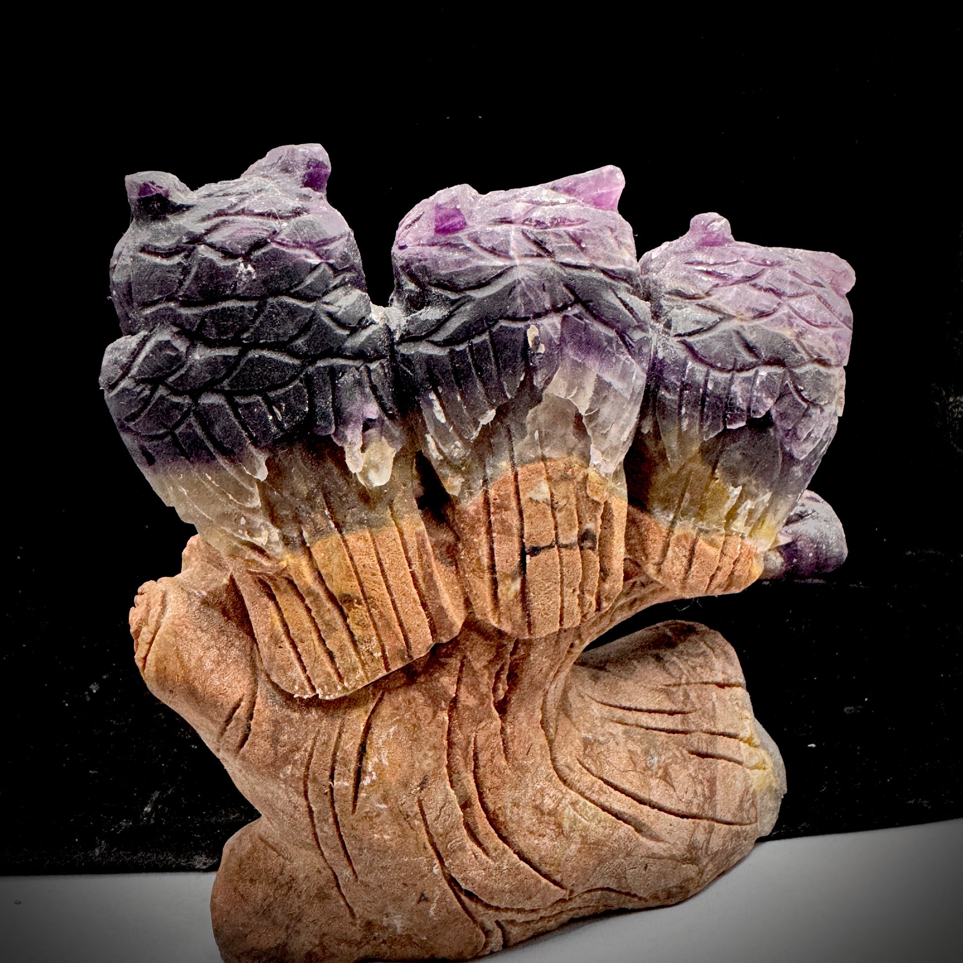  Energy clearing crystal owl set in peaceful meditation space arrangement