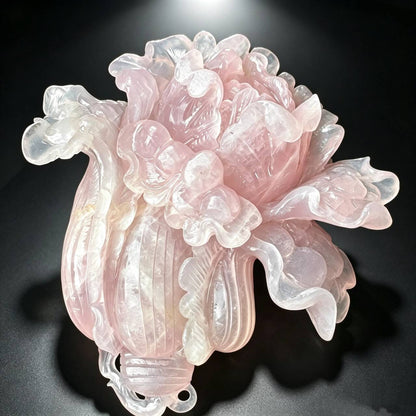 Natural rose quartz hand carved cabbage sculpture front angle with detailed overlapping leaves