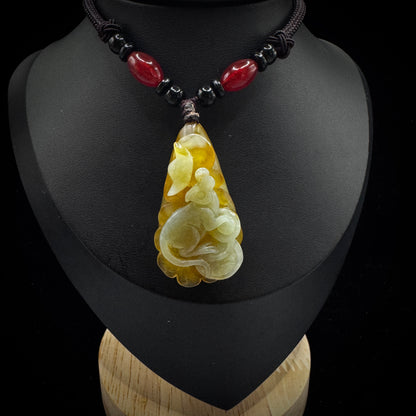 Hand carved Chinese zodiac rat pendant from natural Xiuyan rock