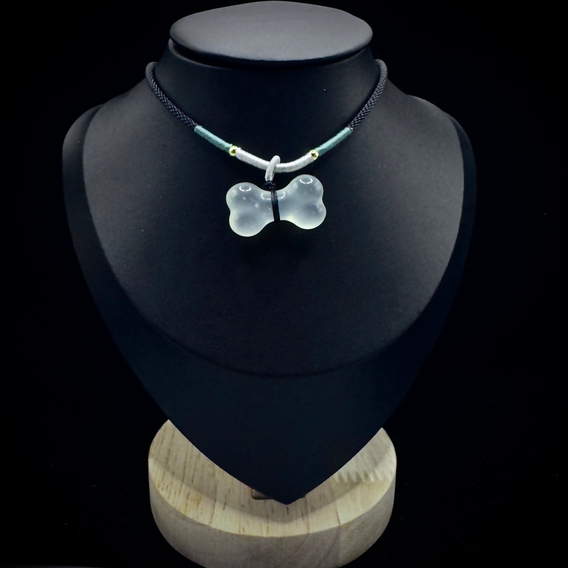 A model wearing a bone choker necklace, showcasing a fashion look that combines style and spirituality.